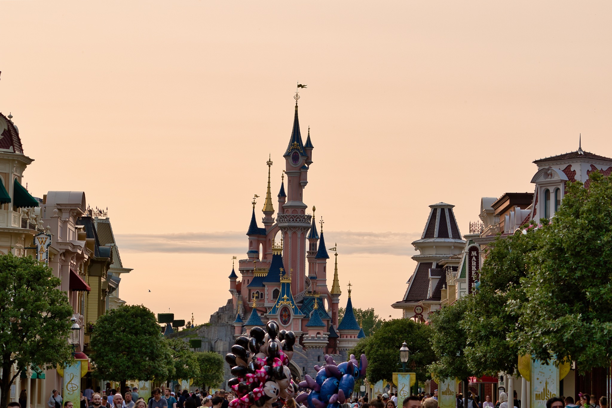 Disneyland Park: Castle, Buildings, and Crowds at Disneyland Paris, France.