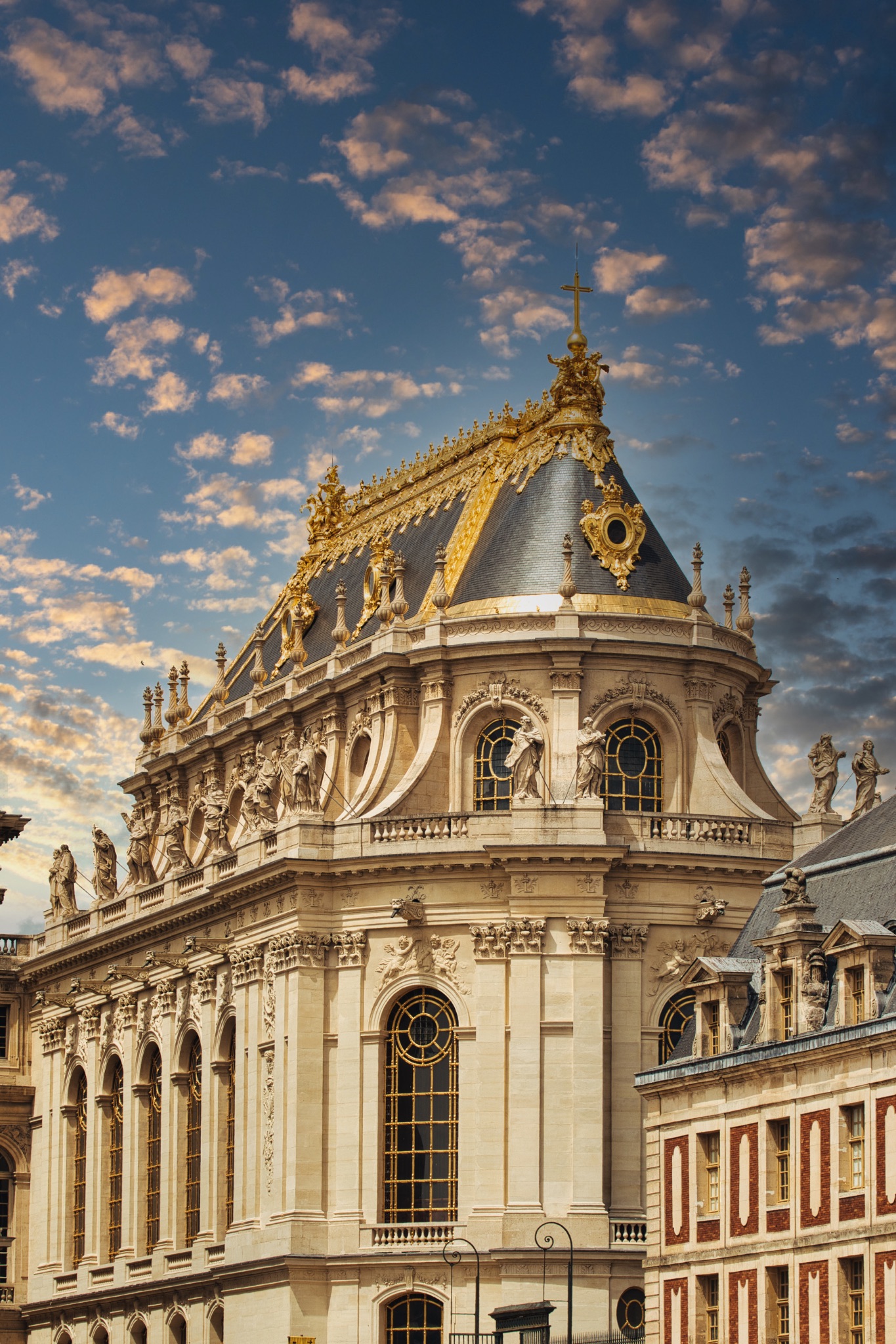 Architectural Detail of Building with Ornate Roof and Sky at Versailles Gardens, Paris.