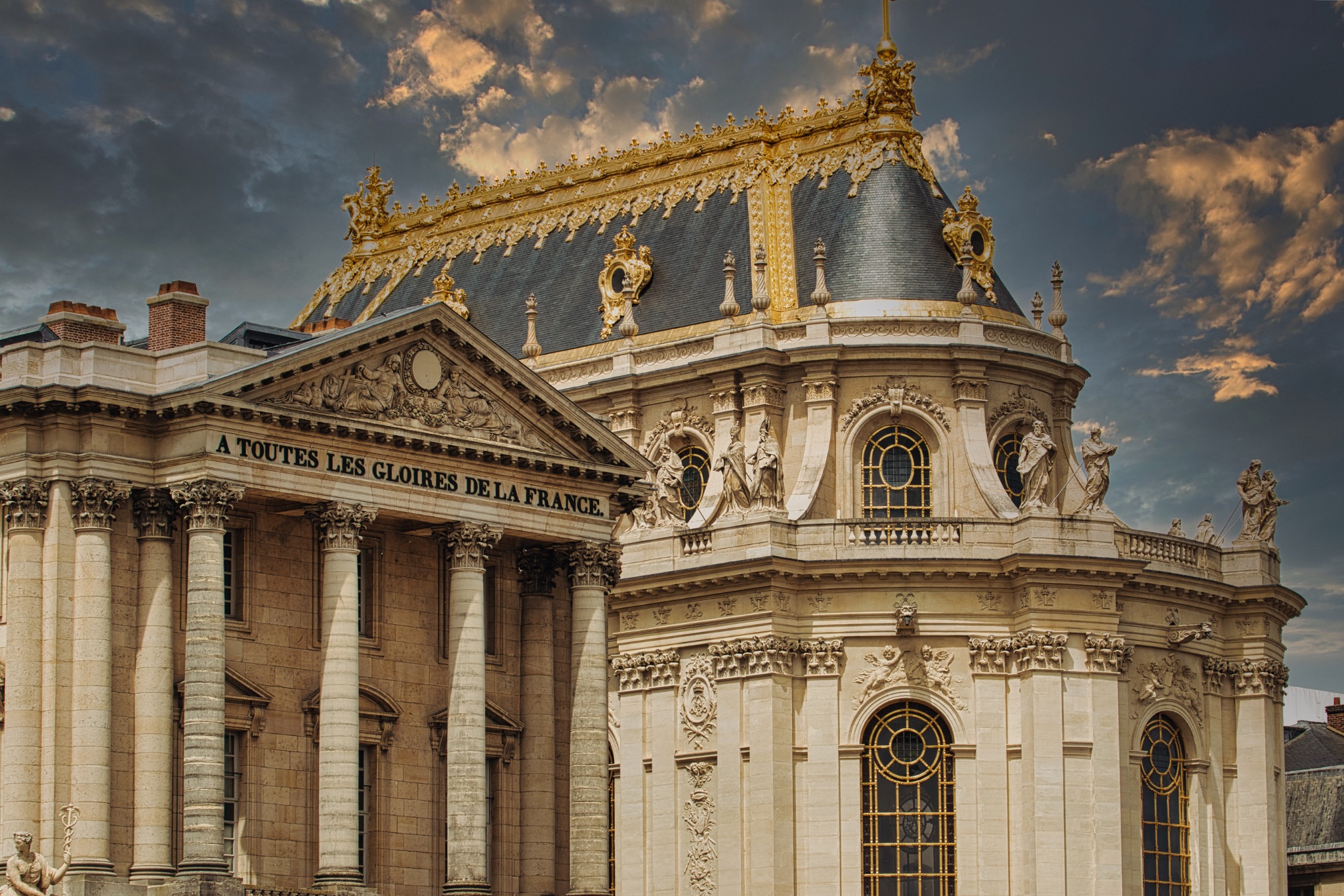 Versailles Palace Architecture with Golden Accents and Cloudy Sky